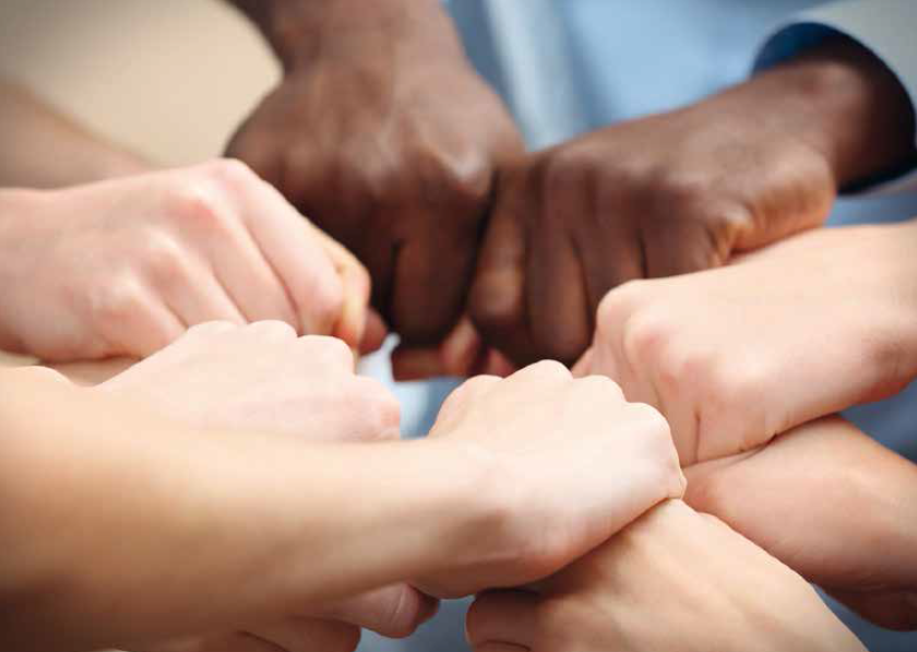 Hände als Symbol für Zusammenarbeit im Arbeitsmarktprogramm