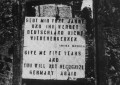 Plakat an einer Mauer in der Innenstadt (nach 1945)